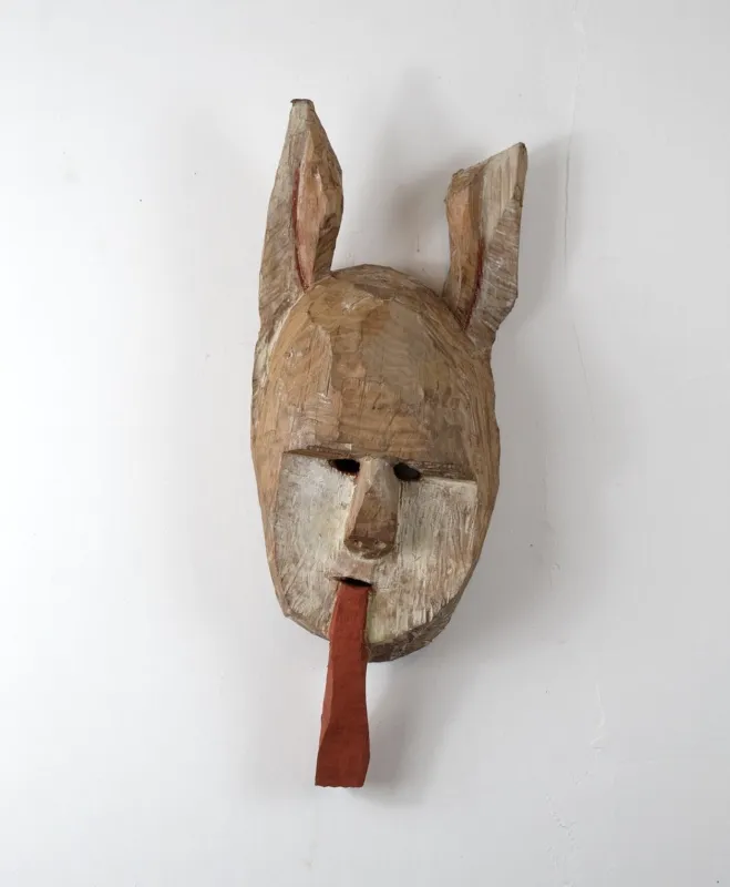 Mask with reg tong.